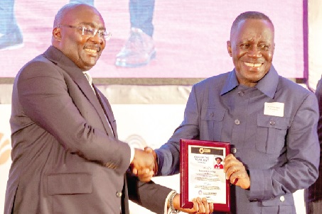 Kwame Osei-Prempeh (right), Group CEO  and MD of GOIL, receiving the award from Dr Mahamudu Bawumia
